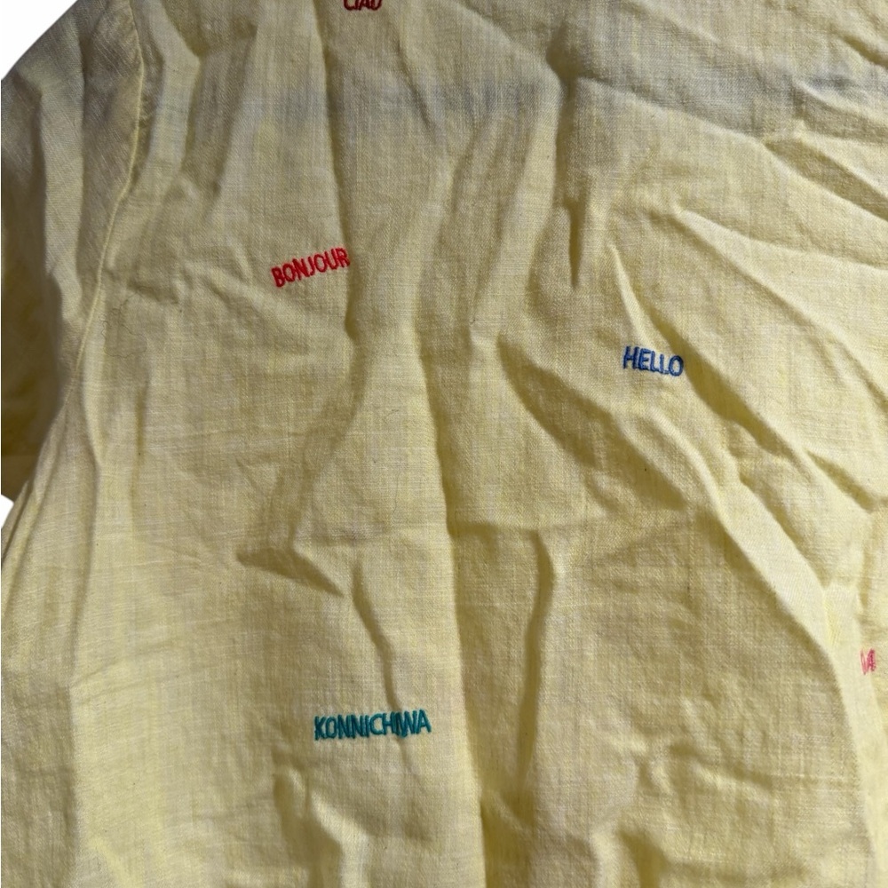 Marine Layer Yellow Top with Colorful Greeting words. Gently Used. - Picture 8 of 9